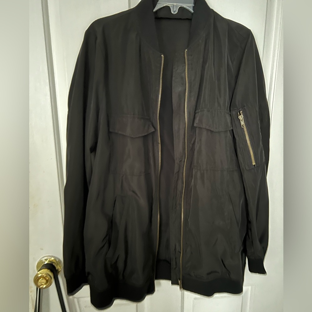 I am selling a black jacket that is similar to a bomber jacket